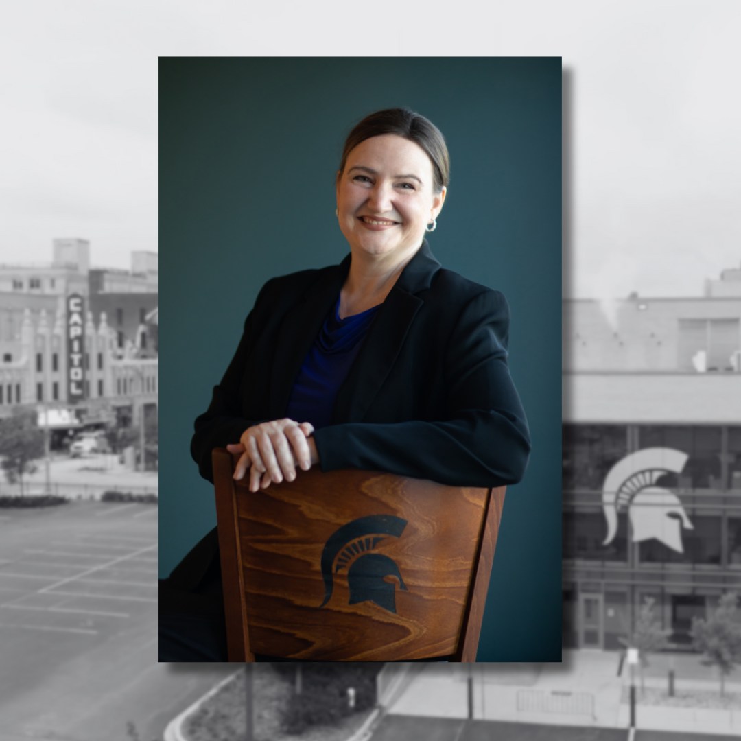 Jennifer Johnson sitting in a chair facing forward.